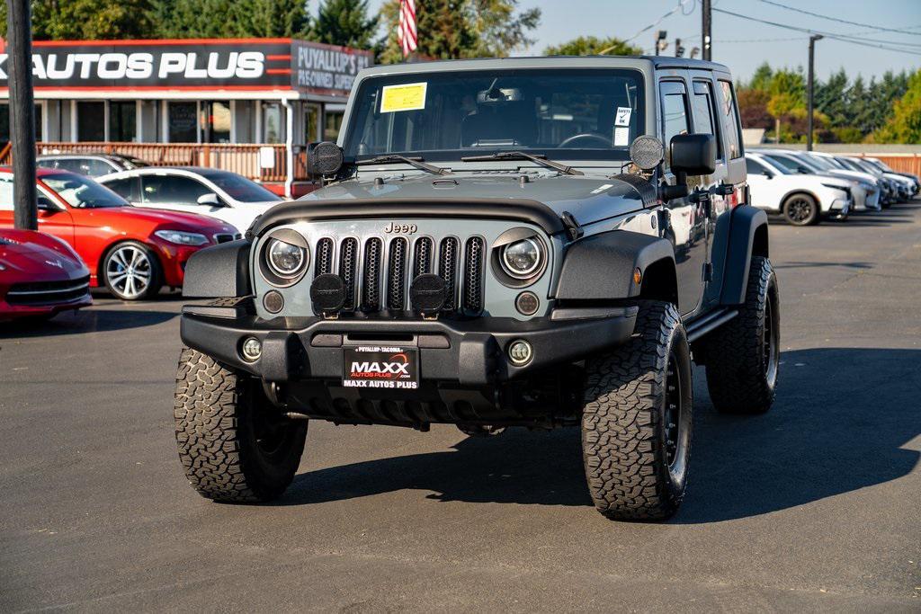used 2014 Jeep Wrangler Unlimited car, priced at $21,697