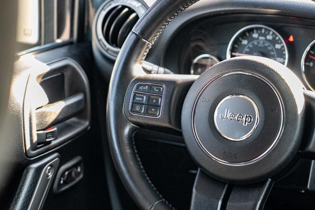 used 2014 Jeep Wrangler Unlimited car, priced at $21,697
