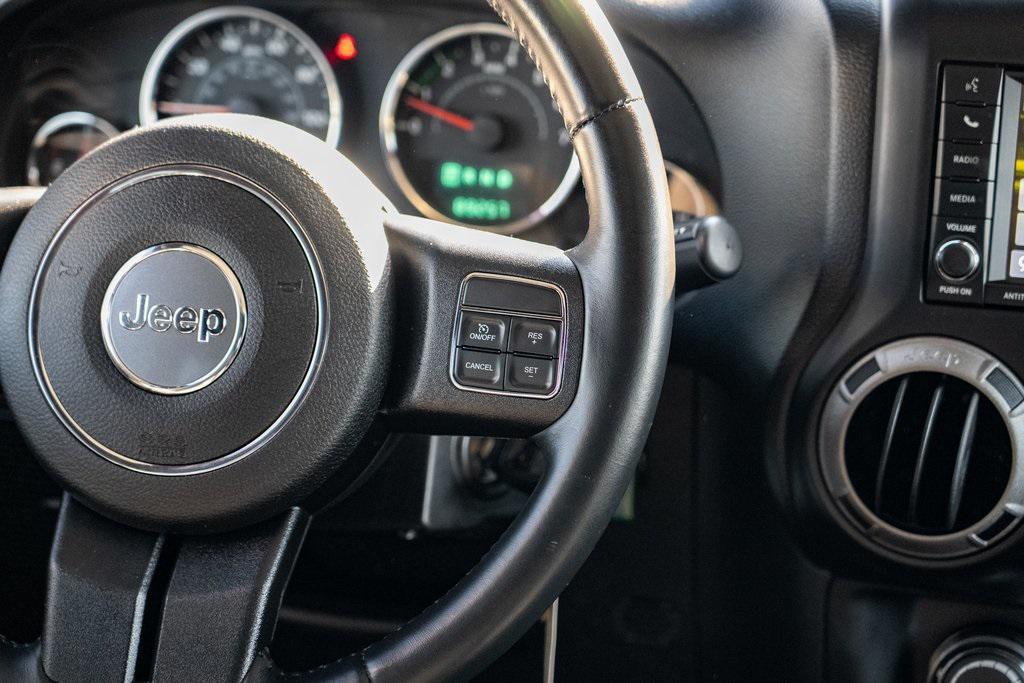 used 2014 Jeep Wrangler Unlimited car, priced at $21,697