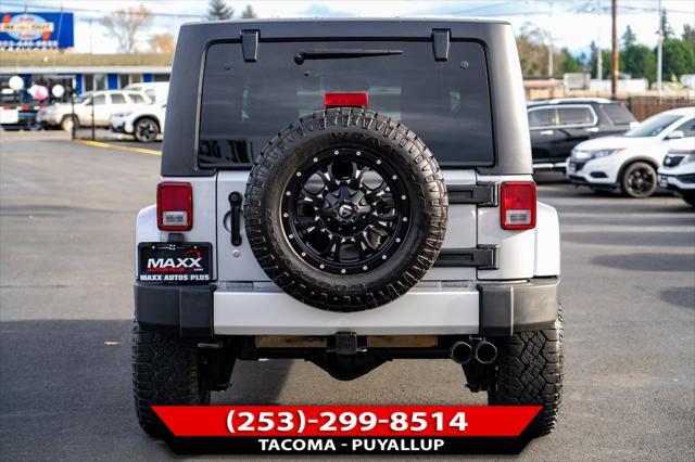 used 2014 Jeep Wrangler Unlimited car, priced at $23,998