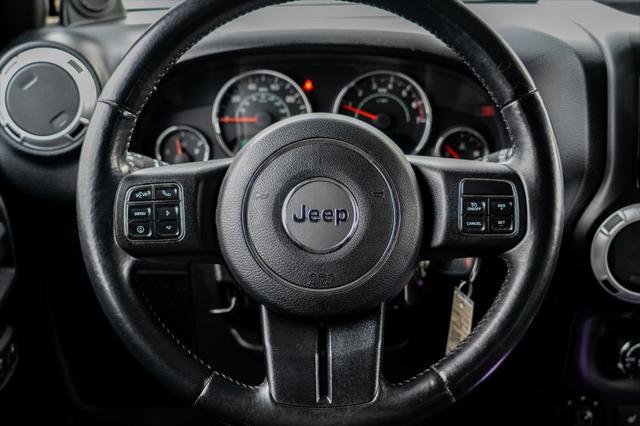 used 2013 Jeep Wrangler Unlimited car, priced at $15,997