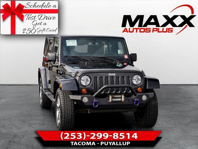 used 2013 Jeep Wrangler Unlimited car, priced at $16,497