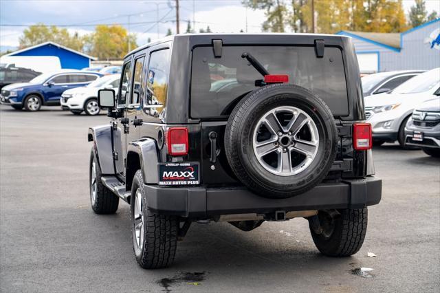 used 2013 Jeep Wrangler Unlimited car, priced at $15,997