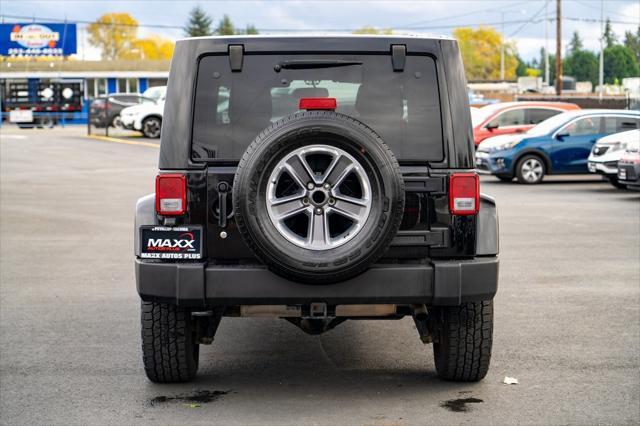 used 2013 Jeep Wrangler Unlimited car, priced at $15,997