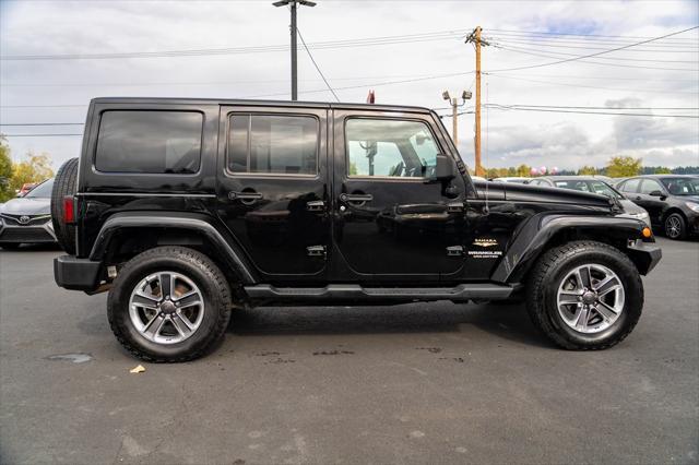 used 2013 Jeep Wrangler Unlimited car, priced at $15,997