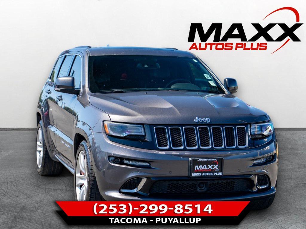 used 2014 Jeep Grand Cherokee car, priced at $27,497