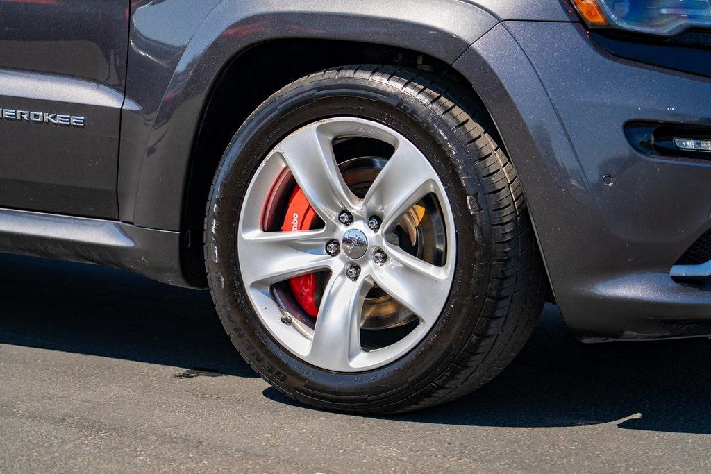 used 2014 Jeep Grand Cherokee car, priced at $27,497