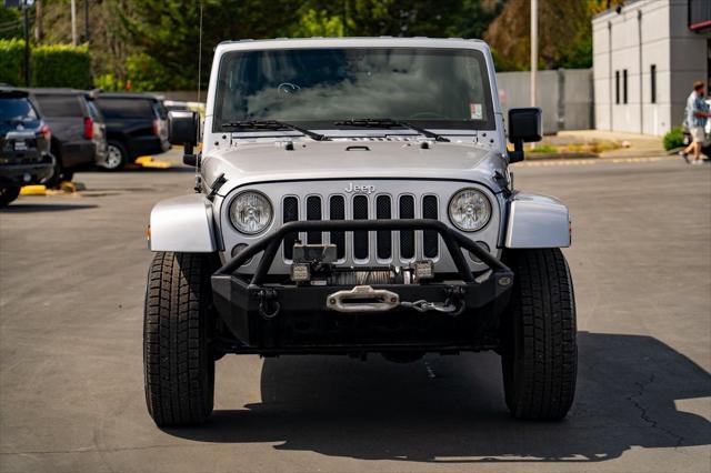 used 2016 Jeep Wrangler Unlimited car, priced at $23,997