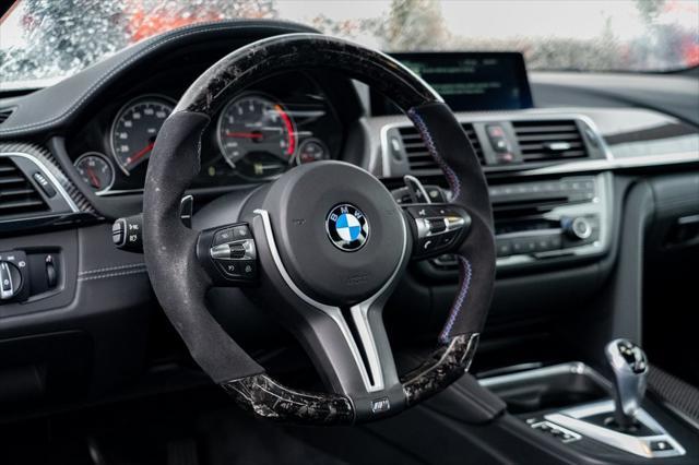 used 2016 BMW M4 car, priced at $49,997