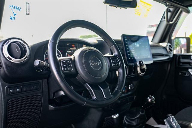 used 2017 Jeep Wrangler Unlimited car, priced at $23,987