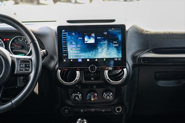 used 2017 Jeep Wrangler Unlimited car, priced at $23,987