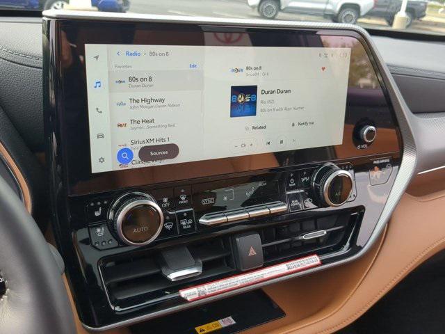 used 2025 Toyota Highlander Hybrid car, priced at $54,421