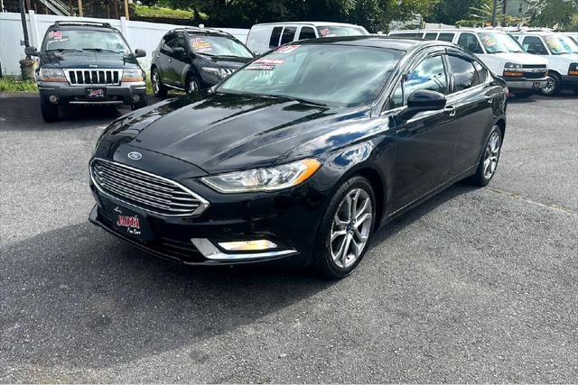 used 2017 Ford Fusion car, priced at $13,900