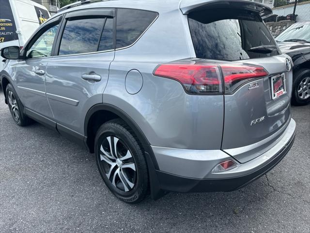 used 2018 Toyota RAV4 car, priced at $17,900