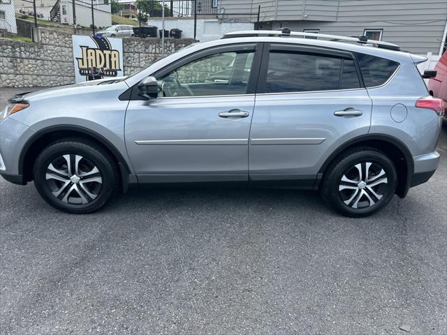 used 2018 Toyota RAV4 car, priced at $17,900