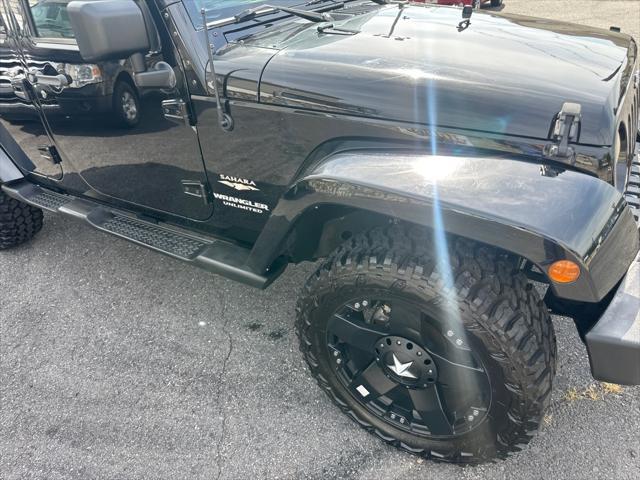 used 2011 Jeep Wrangler Unlimited car, priced at $17,900