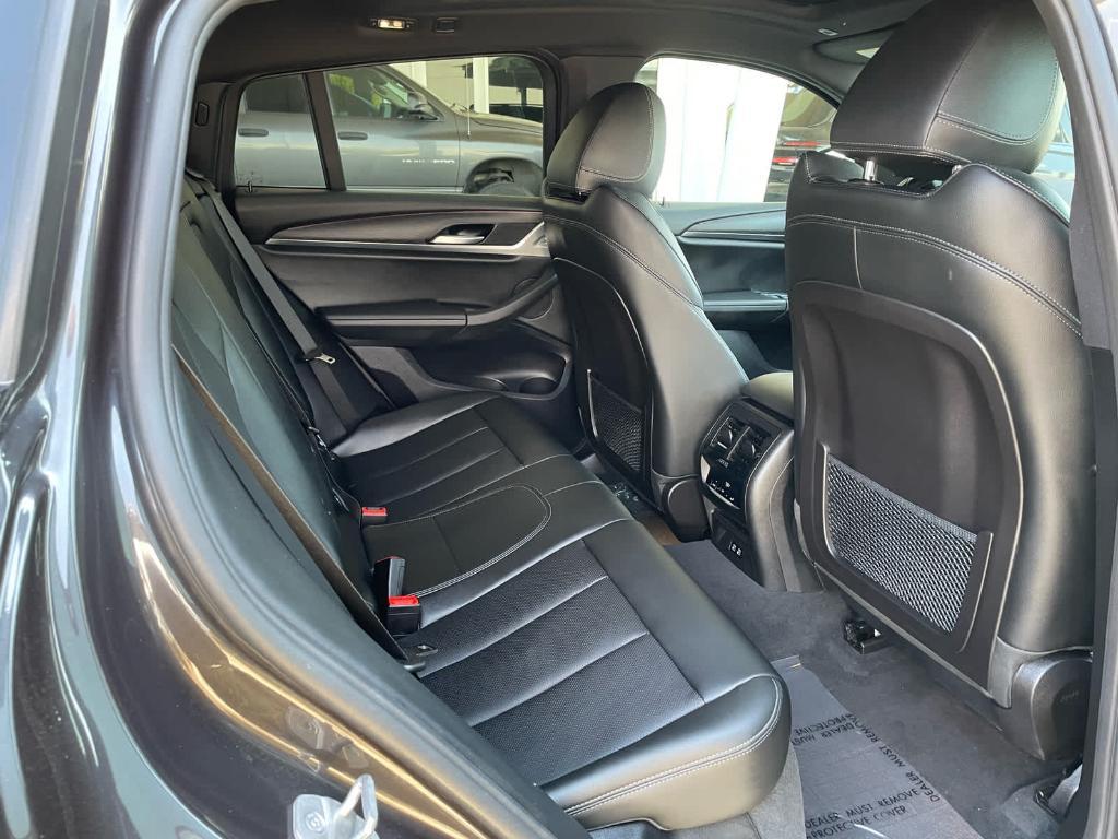 used 2023 BMW X4 car, priced at $44,999