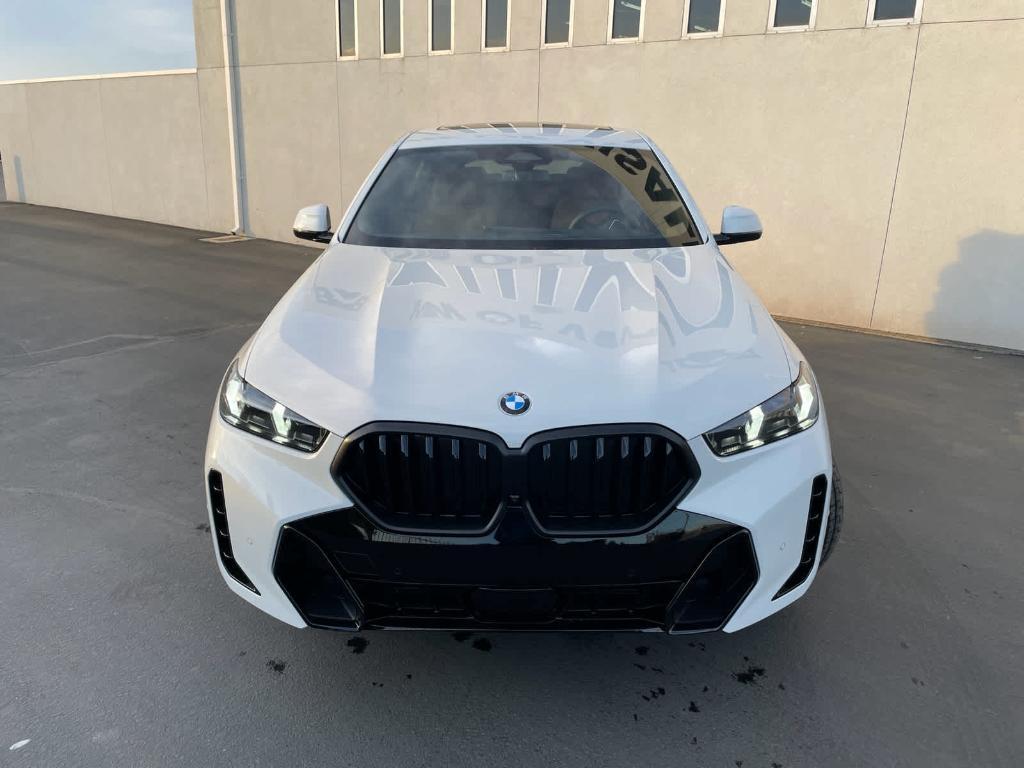 new 2025 BMW X6 car, priced at $84,925