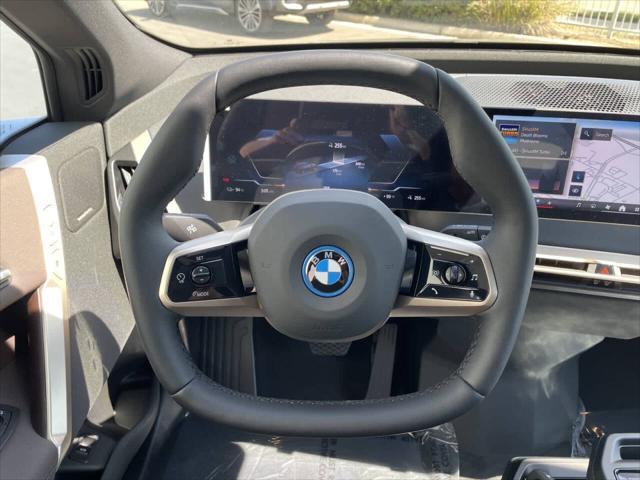 new 2025 BMW iX car, priced at $98,875