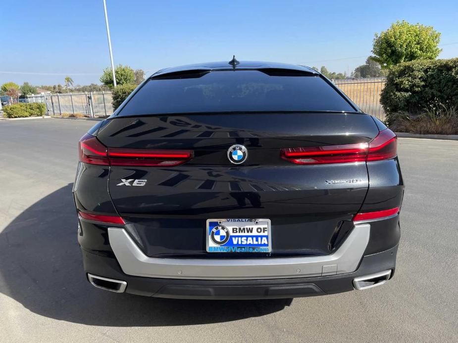 used 2022 BMW X6 car, priced at $53,689