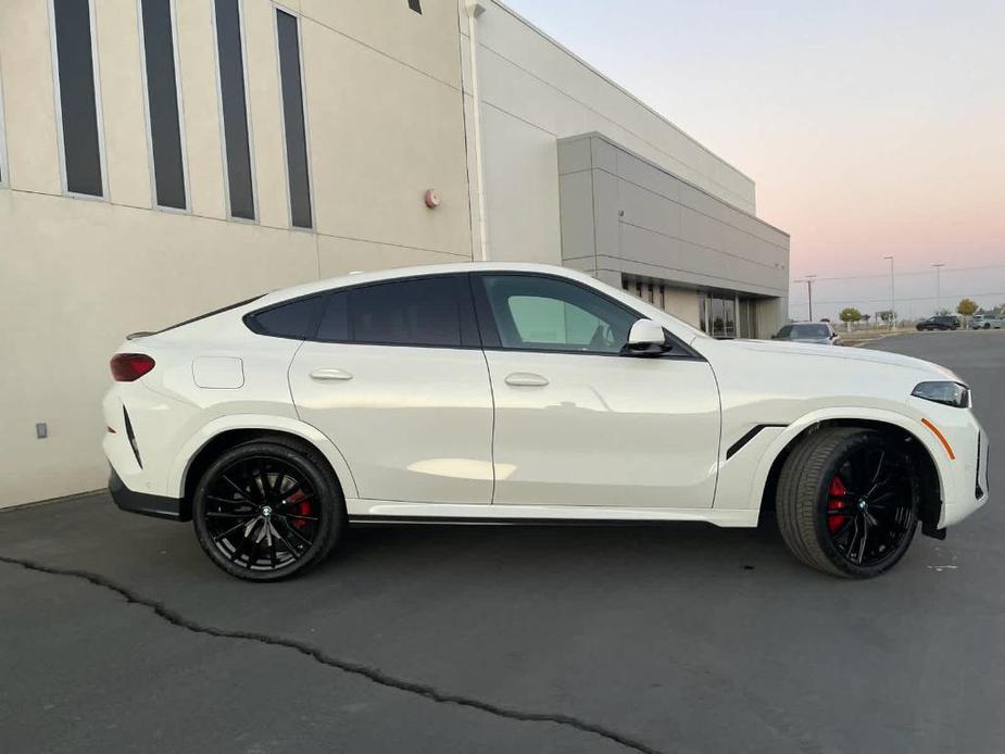 new 2025 BMW X6 car, priced at $89,510