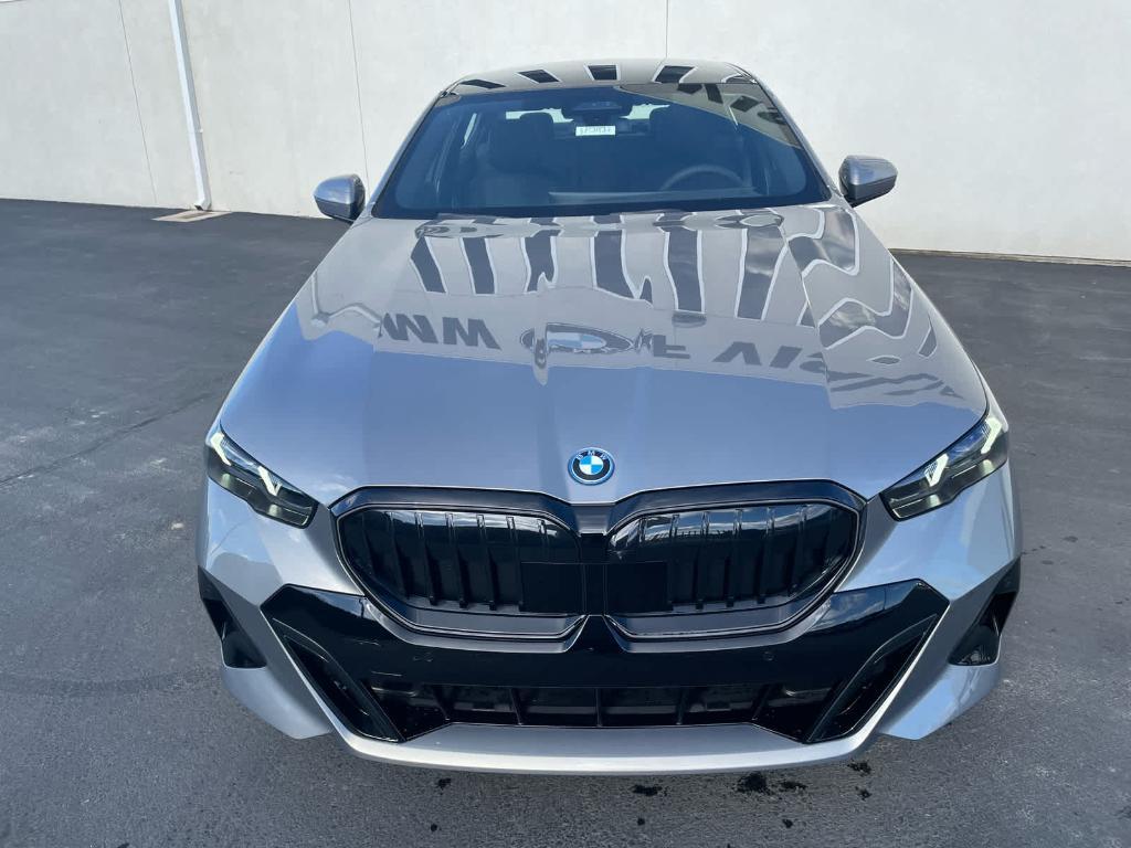 new 2025 BMW 550e car, priced at $83,375