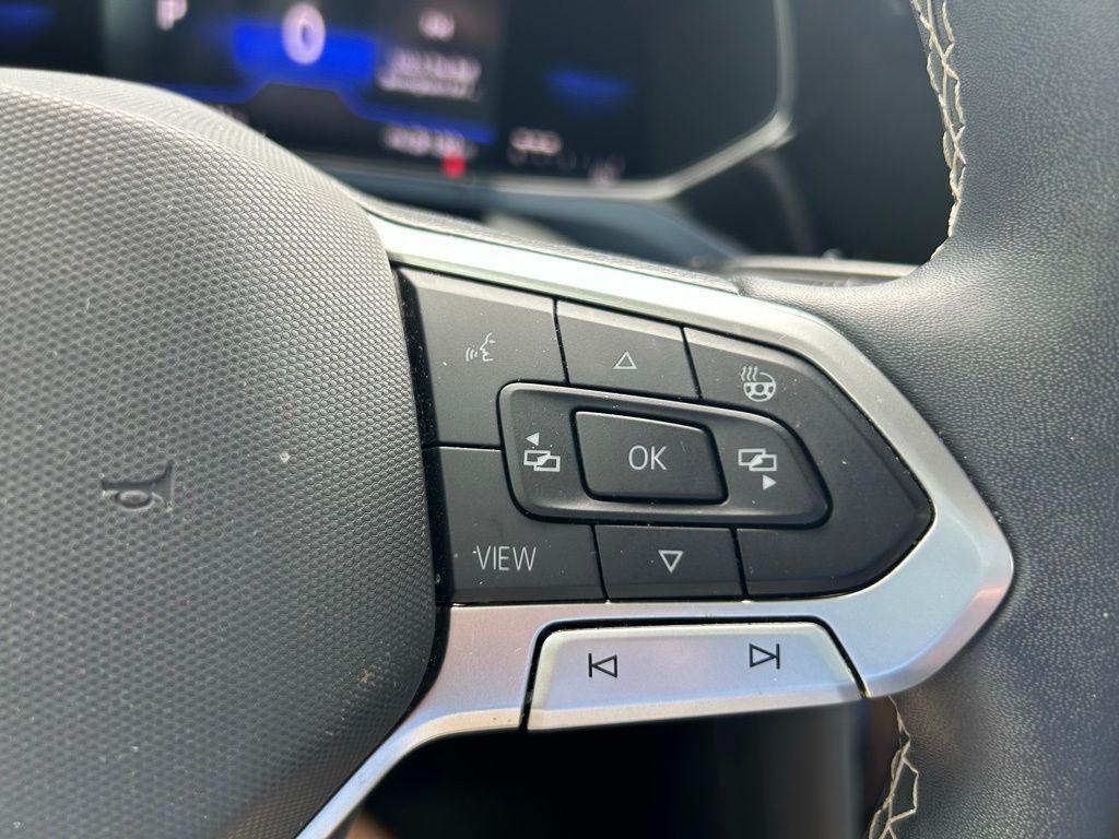 used 2023 Volkswagen Taos car, priced at $19,437
