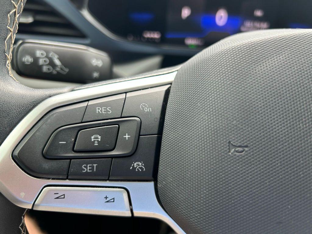 used 2023 Volkswagen Taos car, priced at $19,437