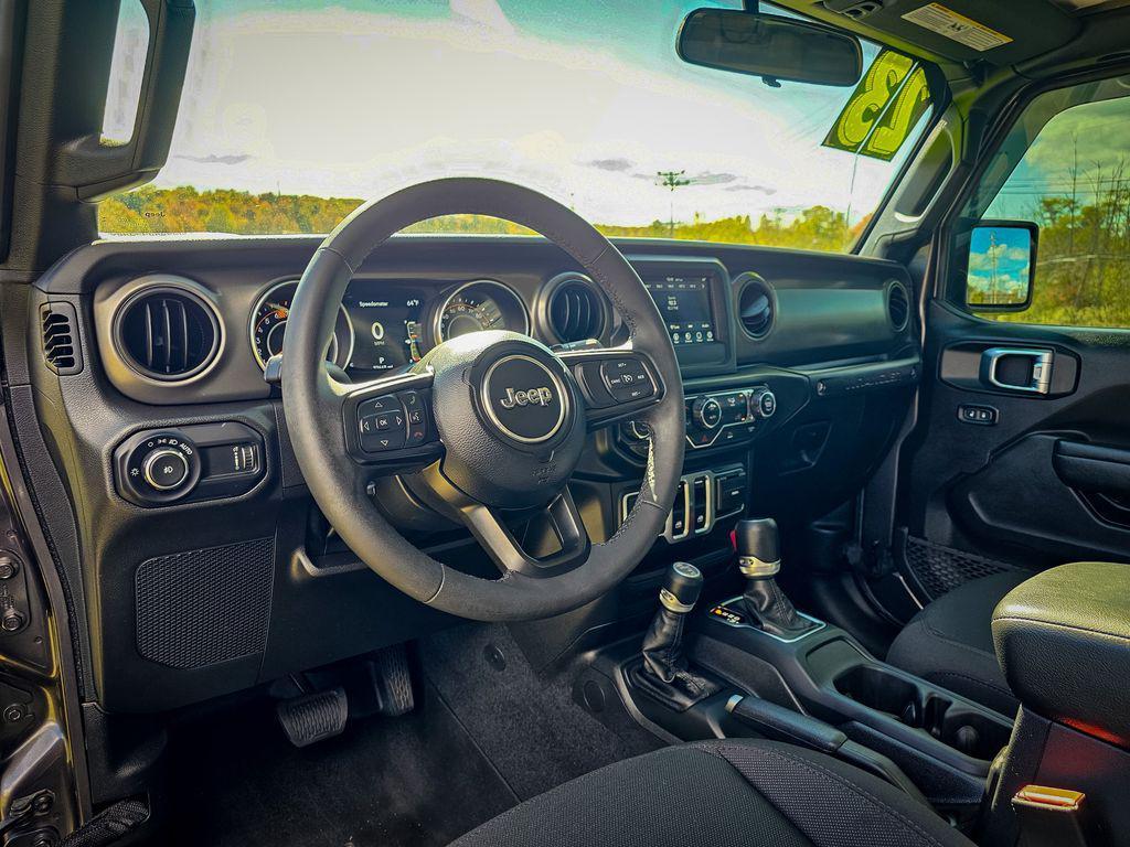 used 2023 Jeep Wrangler car, priced at $30,900