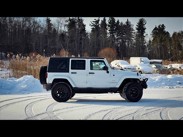 used 2015 Jeep Wrangler Unlimited car, priced at $15,900