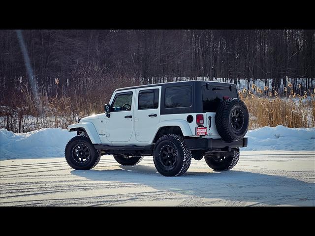 used 2015 Jeep Wrangler Unlimited car, priced at $15,900