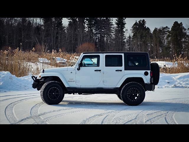 used 2015 Jeep Wrangler Unlimited car, priced at $15,900