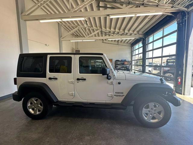 used 2011 Jeep Wrangler Unlimited car, priced at $16,790