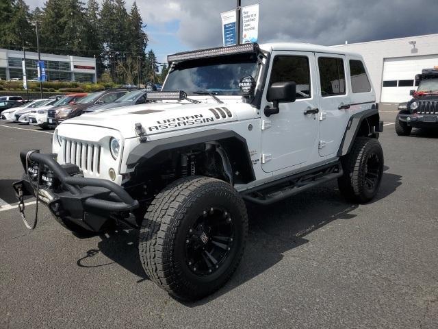 used 2015 Jeep Wrangler Unlimited car, priced at $27,447