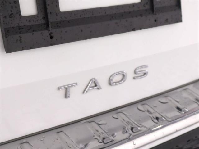 used 2024 Volkswagen Taos car, priced at $27,500