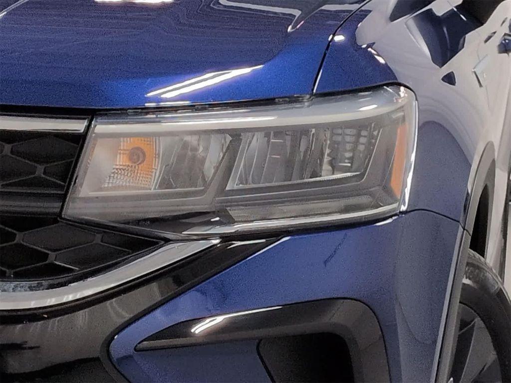 used 2022 Volkswagen Taos car, priced at $20,000