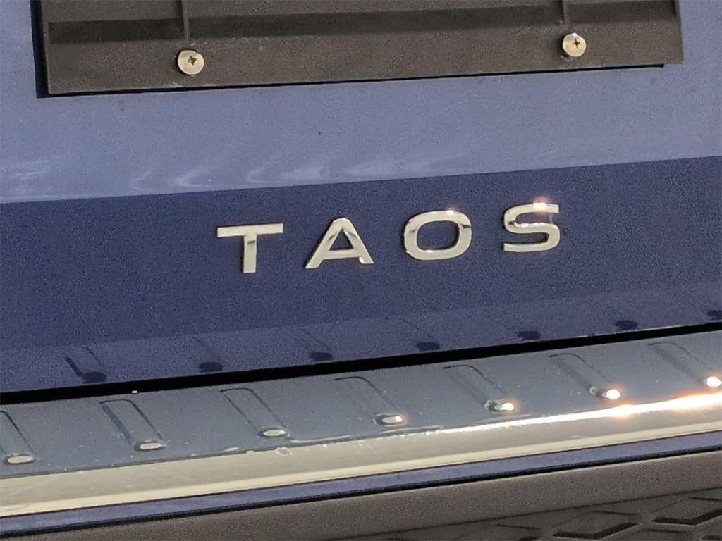 used 2022 Volkswagen Taos car, priced at $20,000