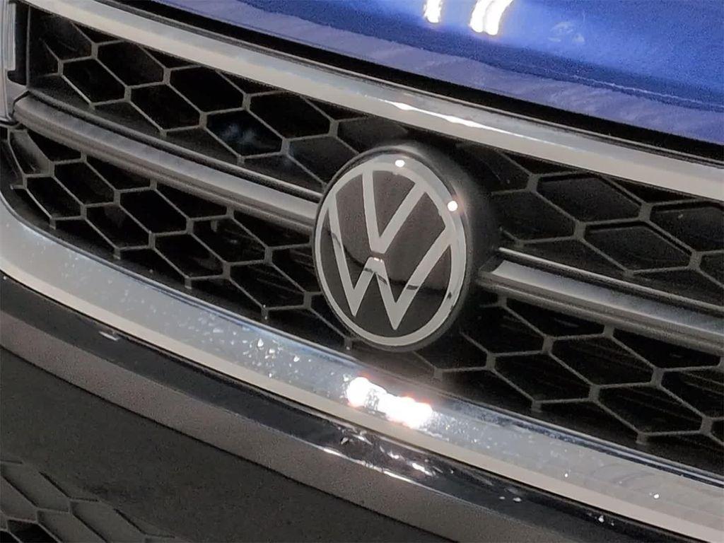 used 2022 Volkswagen Taos car, priced at $20,000