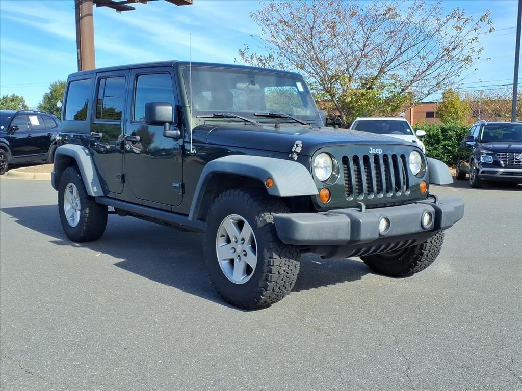 used 2011 Jeep Wrangler Unlimited car, priced at $6,999