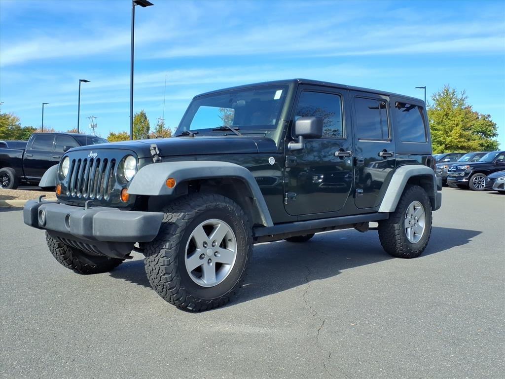 used 2011 Jeep Wrangler Unlimited car, priced at $6,999