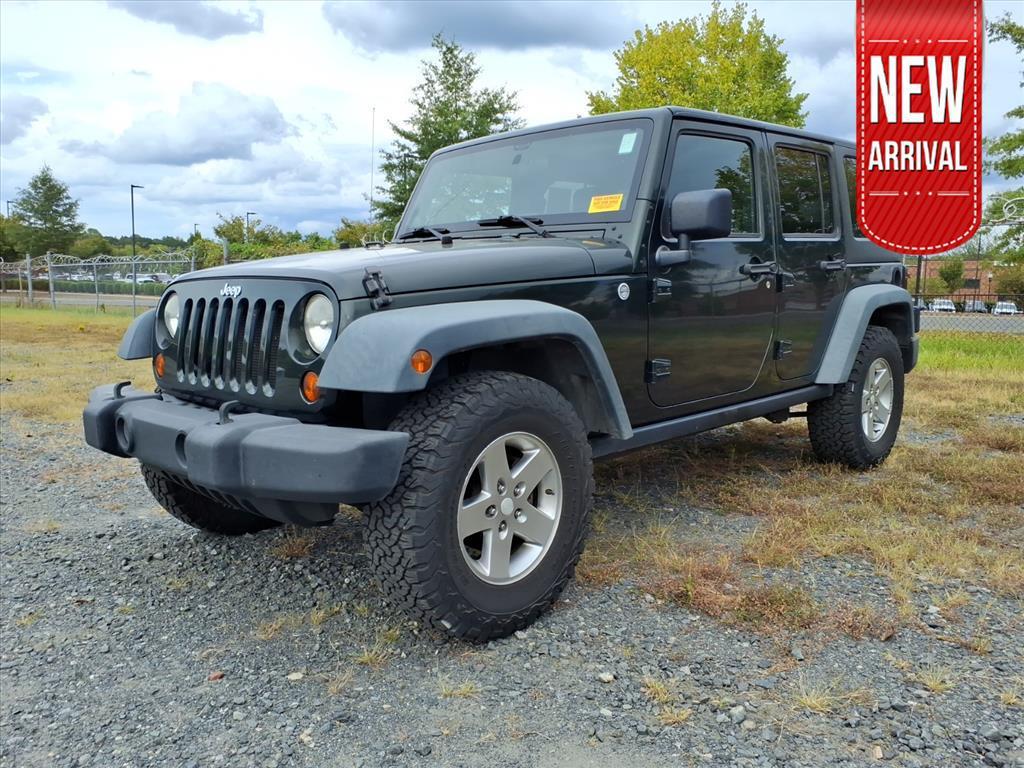 used 2011 Jeep Wrangler Unlimited car, priced at $8,395