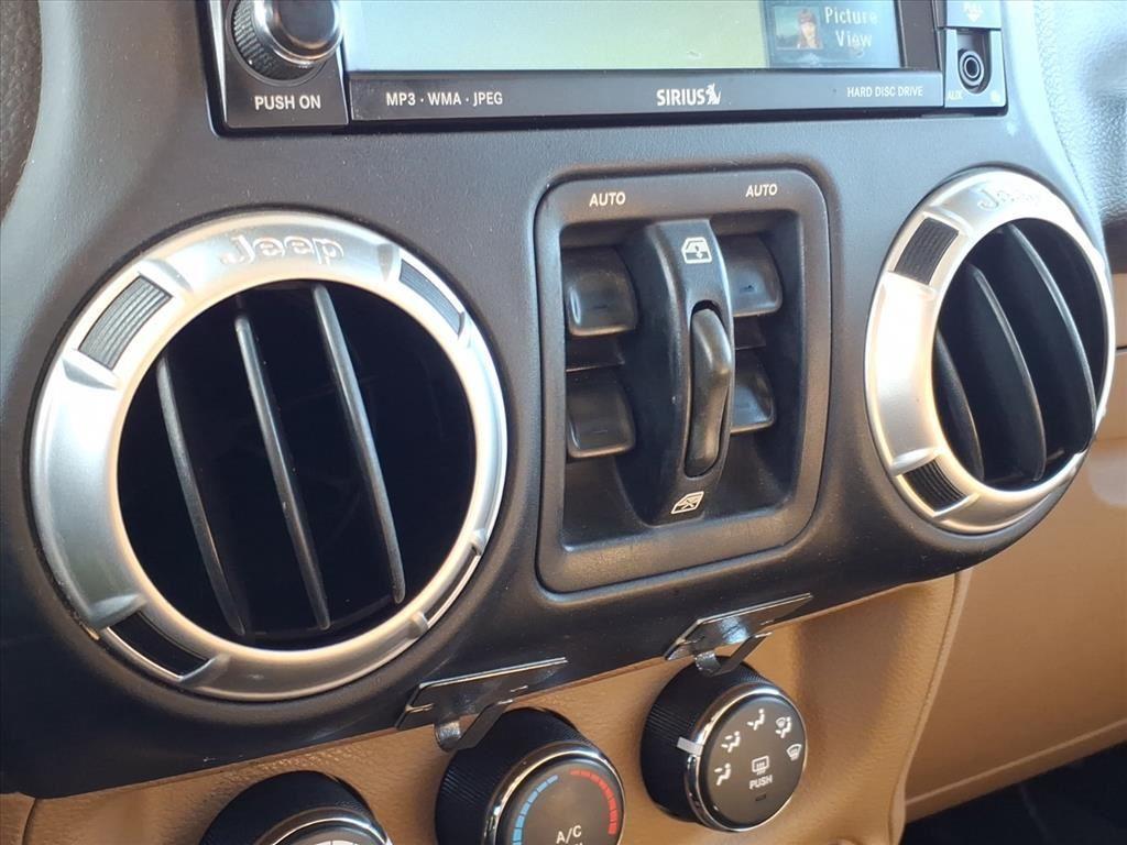 used 2011 Jeep Wrangler Unlimited car, priced at $6,999