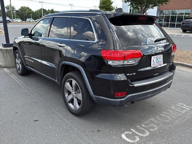 used 2014 Jeep Grand Cherokee car, priced at $15,021