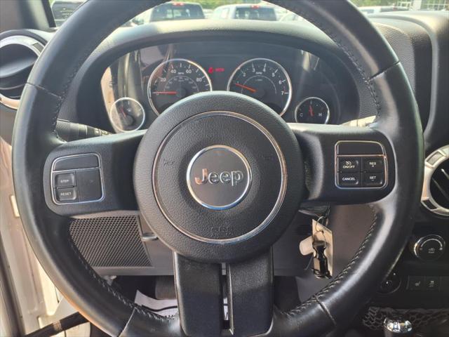 used 2015 Jeep Wrangler Unlimited car, priced at $22,645