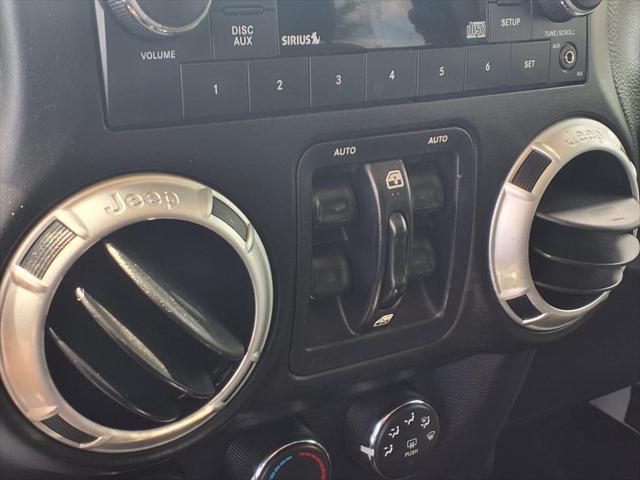 used 2015 Jeep Wrangler Unlimited car, priced at $22,645