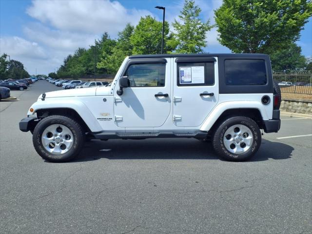used 2015 Jeep Wrangler Unlimited car, priced at $22,645