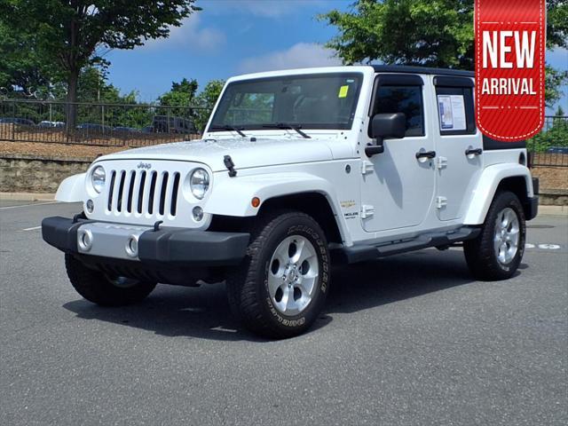 used 2015 Jeep Wrangler Unlimited car, priced at $22,645