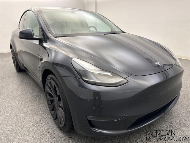 used 2024 Tesla Model Y car, priced at $42,999