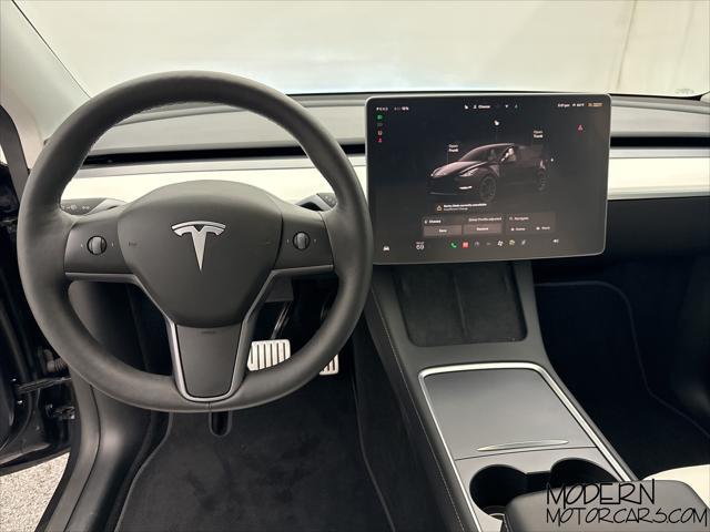 used 2024 Tesla Model Y car, priced at $42,999