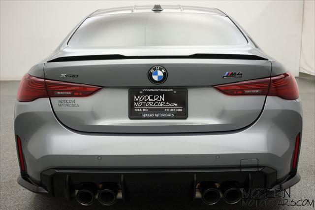 used 2025 BMW M4 car, priced at $89,999